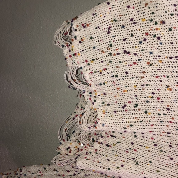 A cute colorful sweater with  a distressed bottom - Picture 3 of 6